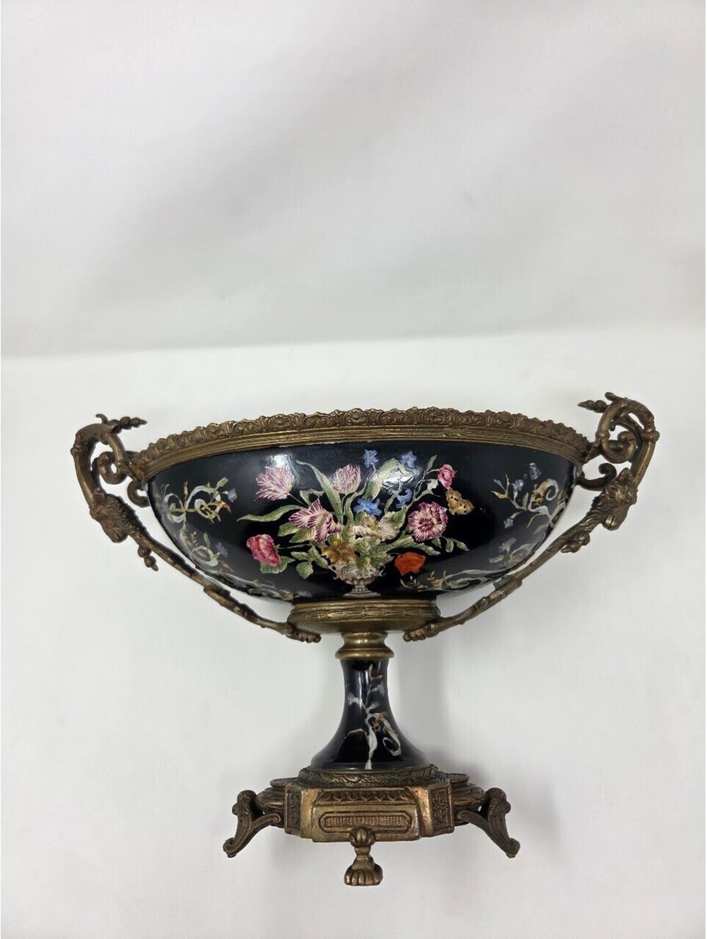 Ornate Enameled Brass Pedestal Bowl With Floral Design And Decorative Handles